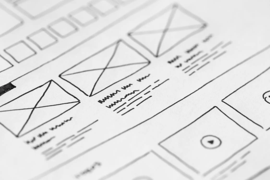 Image showing wireframe of websites designed on a piece of paper